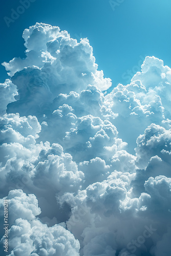 Fluffy cloud formation against blue sky photo