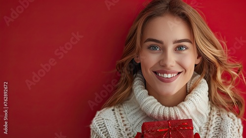 Joyful Gift Giving: Smiling Woman Presents Gift Box on Red Background 
