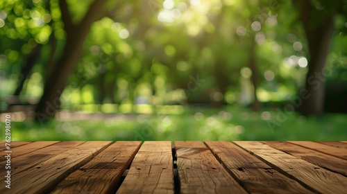 Empty rustic wooden texture of old wood table top blur against green park with defocused sunlight blurred foliage backyard background Display mock up montage your product design key vi : Generative AI