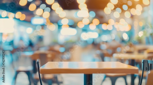 Blur bokeh background of interior table and chair in mall canteen Abstract bokeh of food business dining court with no person defocused of light retail lifestyle cafe shop decoration i : Generative AI photo