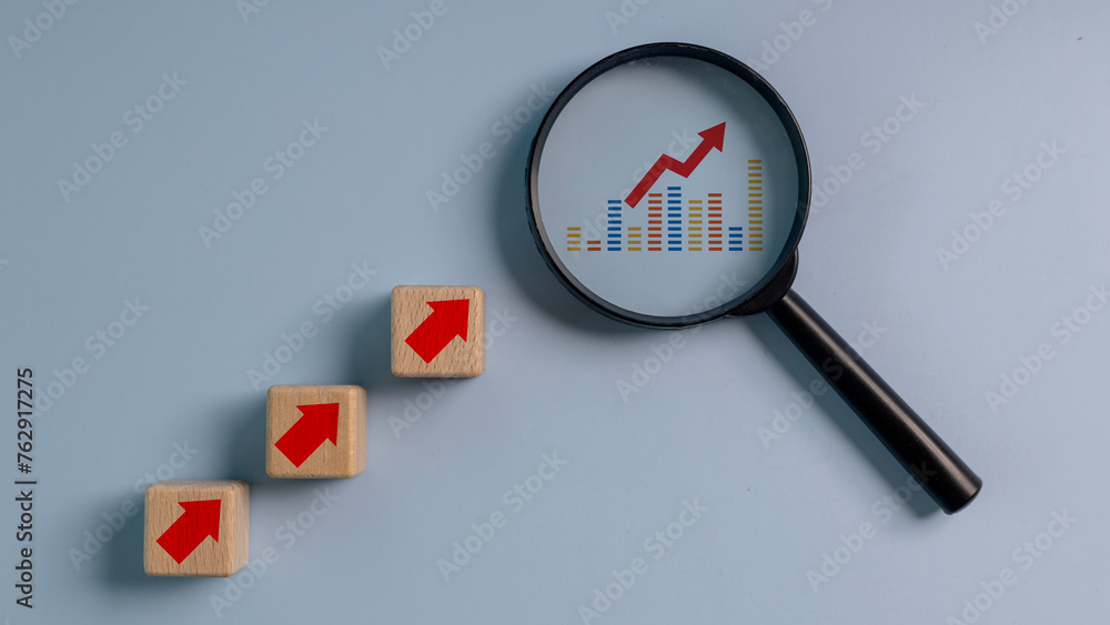 Business achievement goal and target, Planning, and development for the corporation. Graph and arrow up icon on wooden blocks, Business growth success process. Business achievement goal and target, Planning, and development for the corporation. Graph and arrow up icon on wooden blocks, Business growth success process.