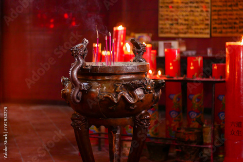 incense sticks for worship in a monastery in Jakarta's Chinatown area. translations: six ways sentient beings photo