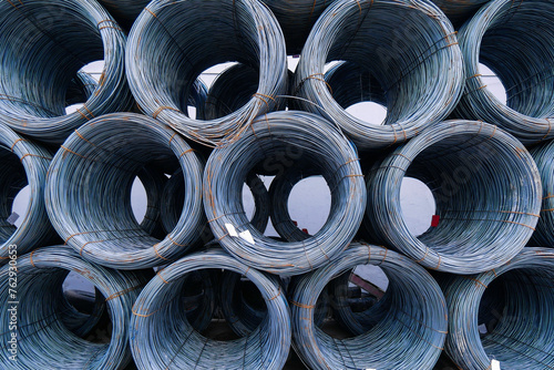 coils of iron or steel wire stacked in harbor