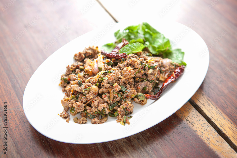 Isaan Delicacy: Flavorful Pork Larb - A Culinary Journey into Thai Street Food Isaan Delicacy: Flavorful Pork Larb - A Culinary Journey into Thai Street Food