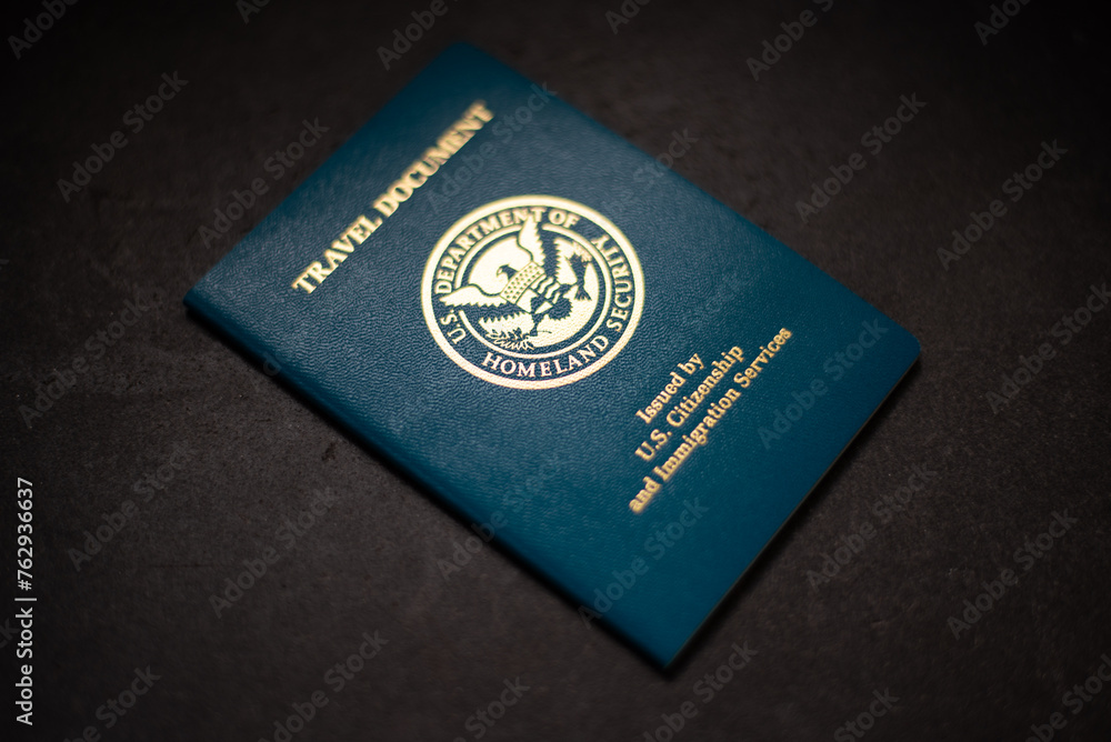 USA Re-entry Permit on black background with shallow focus USA Re-entry Permit on black background with shallow focus