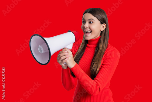 Teen girl with loudspeaker isolated on red. Sale announcement. Announce advertisement. Hurry up. Season sale. Promotion offering of sale. Teen girl announcer promote idea. Announcement concept photo