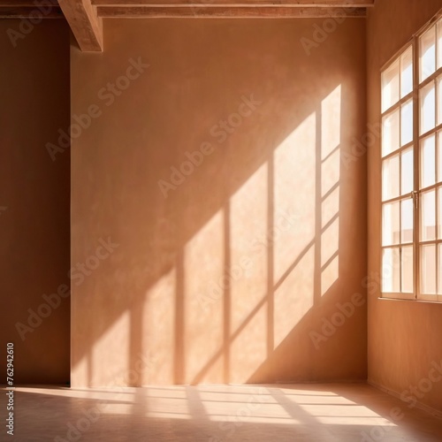 Blank beige neutral backdrop of home interior wall with light streaming  for product mockup