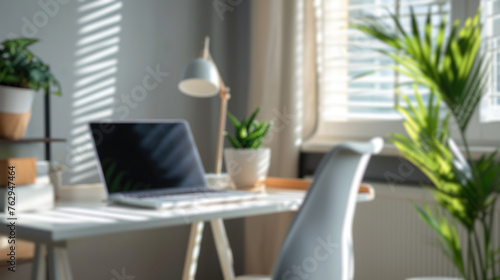 Soft focus on a home office setup with stylish furnishings and indoor plants. Resplendent.