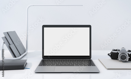 Empty white screen laptop, copy space on the device, working desk decoration with a pot of small plant, mockup office table and white background, work from home concept, 3d rendering