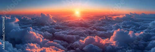 Beautiful morning sky displays a stunning sunrise above clouds, with dramatic light creating a captivating scene.
