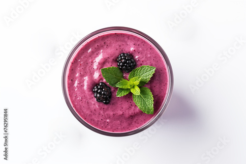 Delicious and creamy blackberry smoothie garnished with fresh mint leaves, offering a refreshing and healthy treat, perfect for breakfast or a snack photo