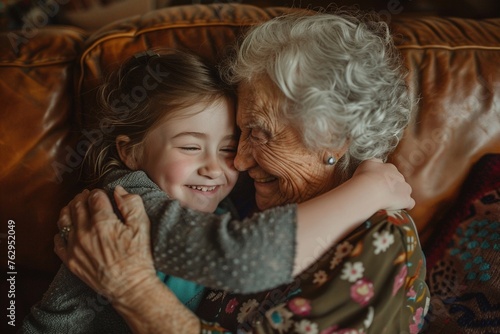 Happy girl hugging her grandmother.