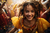 A girl in a yellow dress is smiling and surrounded by confetti
