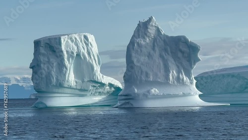 Wonderful icebergs in Hall Bredning. Scoresbysund, Greenland. photo