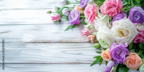 Beautiful Arrangement of Vibrant Pink, White, and Purple Flowers on a Rustic Whitewashed Wooden Table Background, Creating a Charming and Serene Setting for Nature Lovers © evgenia_lo