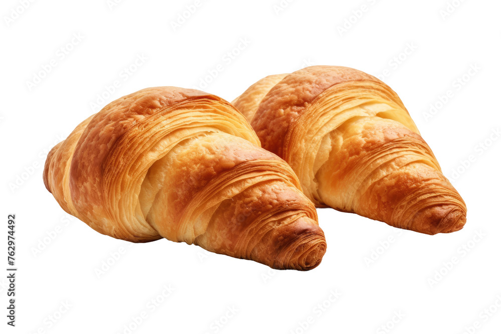 Two Croissants Stacked. On a White or Clear Surface PNG Transparent Background..