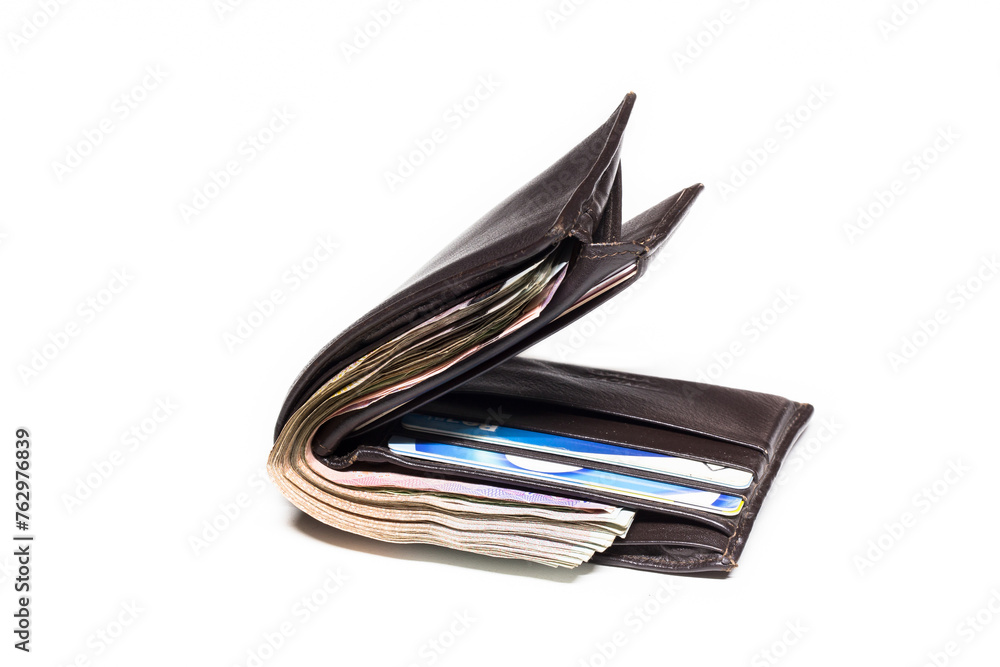 Picture concept with finance and banking. Brown leather wallet with money isolated on white background Picture concept with finance and banking. Brown leather wallet with money isolated on white background