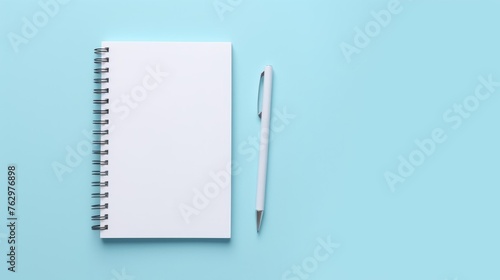 A clean notebook for writing on a colored background, the concept of education, workplace, creativity. A place for text or advertising. © Cherkasova Alie