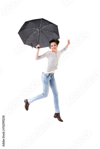 Woman standing under an umbrella.