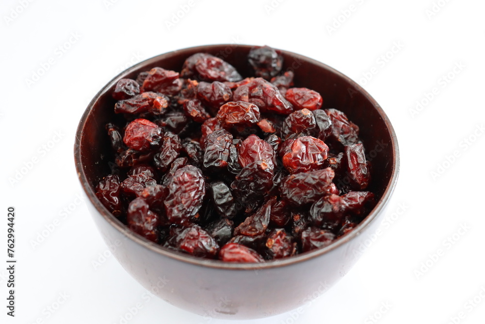 Dried black grape berry Jumbo, close-up with white background Dried black grape berry Jumbo, close-up with white background
