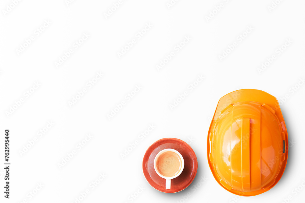 Orange safety engineer helmet isolated on white background. top view with copy space for design.