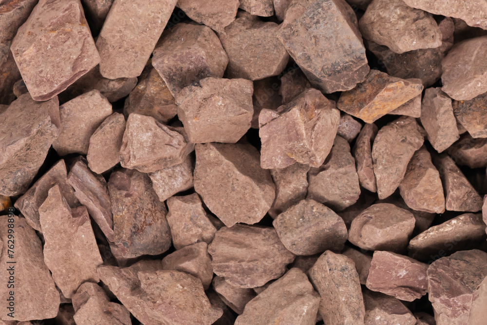 crushed stone crumb background texture close-up. rubble in a heap. natural decorative primer for designers. fraction crushed stone crumb background texture close-up. rubble in a heap. natural decorative primer for designers. fraction