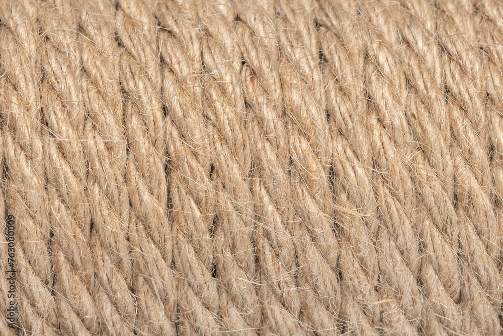 Jute ropes closeup, background texture. thick hemp rope. linen rope-wound. Hank ship rope Jute ropes closeup, background texture. thick hemp rope. linen rope-wound. Hank ship rope