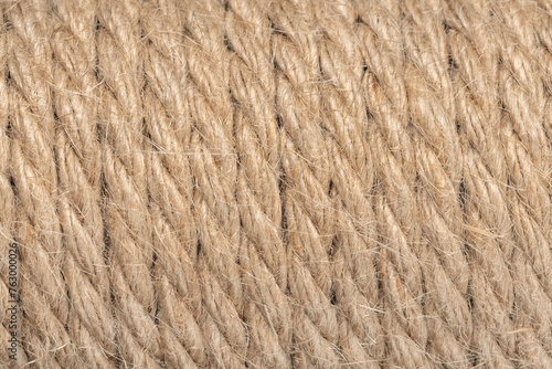 Jute ropes closeup, background texture. thick hemp rope. linen rope-wound. Hank ship rope