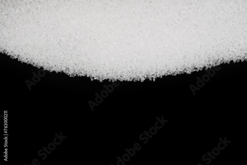 sea salt in black background close up. coarse grind. ultra purified natural