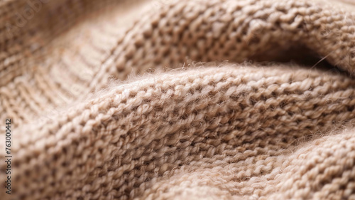 Closeup of a white knitted fabric with a textured pattern