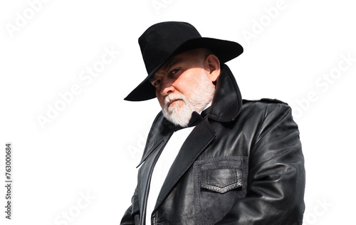 Gangster style. Old-fashioned trendy elegant hipster grandpa in leather coat with bow-tie isolated on white isolated background. Old aged man.