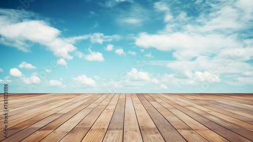 Cloudy blue sky and wood floor background image. ..