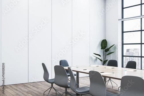 Simple meeting room interior with wooden flooring  window and city view. 3D Rendering.