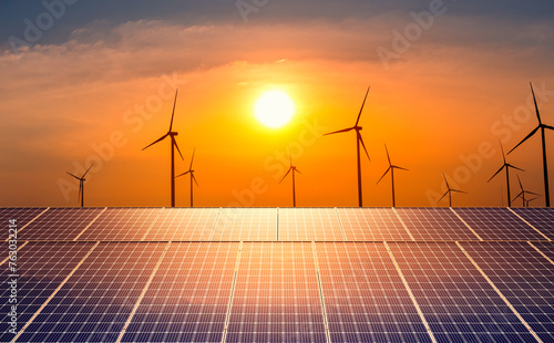 solar panels with wind turbine farm at sunset. clean energy, power supply, distribution of energy, Powerplant, energy transmission, high voltage supply concept