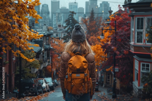 Person Walking With Backpack in Urban Setting