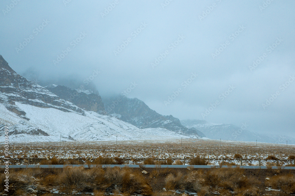 Hainan Mongolian and Tibetan Autonomous Prefecture, Qinghai Province-Grasslands and roads under the snow-capped mountains Hainan Mongolian and Tibetan Autonomous Prefecture, Qinghai Province-Grasslands and roads under the snow-capped mountains
