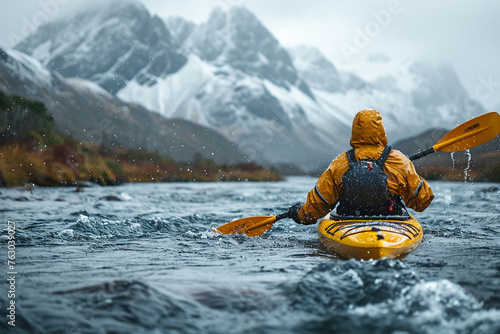 Man kayaking in whitewater rapids with ice axe in hand, navigating the adventurous river