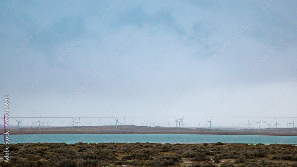 Hainan Mongolian and Tibetan Autonomous Prefecture, Qinghai Province-Grasslands and roads under the snow-capped mountains