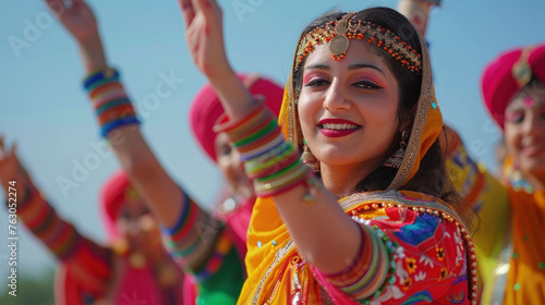 girls dancing folk dance in traditional Indian outfits performing energetic Bhangra dance  on Baisakhi holiday