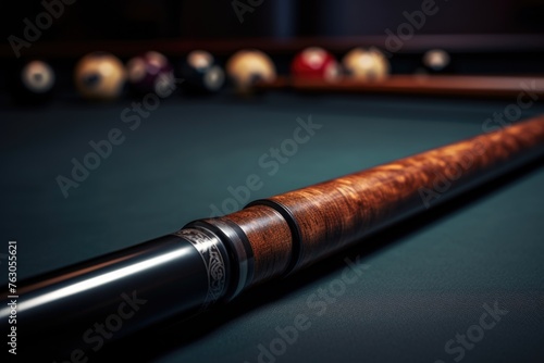 A pool table with a pool cue. Perfect for sports and leisure concepts