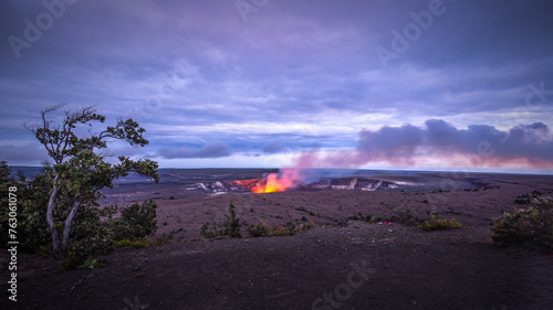 Crater of Kilauea volcano during the last hours of the day, cloudy sunset in Hawaii Volcano National Park, Big Island, Hawaii, United States.