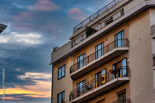 Photography in the city of Taranto capturing some glimpses of the city itself, we are in Puglia, Italy. Shot taken outdoors in February 2024. Photograph taken in the town center at sunset.