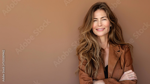 half-length photo, smiling mid age fashion woman, long hair, modern clothes, solid color background, with empty copy space