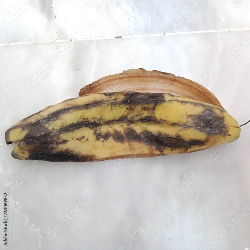 Banana peel on white background .
 photo