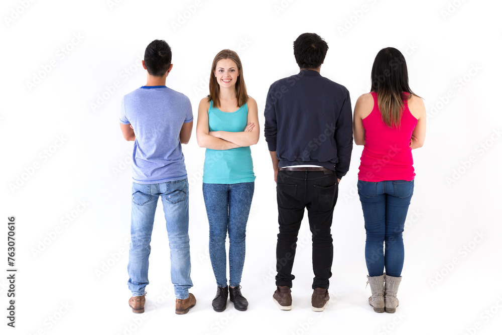 Rear view of friends, one looking back. Rear view of friends, one looking back.