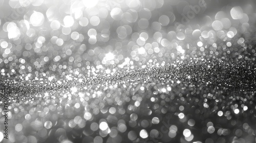 Abstract bokeh lighting in white and silver. Defocused background.