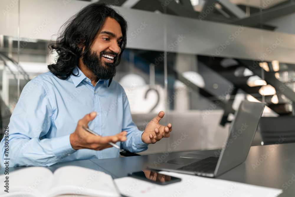Happy businessman using laptop Happy businessman using laptop