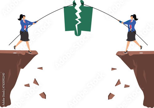 Undermines unity to the detriment of unity. Damage to the team, broken partnership, difficult relationship, two businesswomen tug of war and tear apart the puzzle