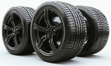 Car wheels with new tires on white background
