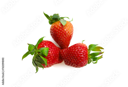 ripe red strawberries on a white background